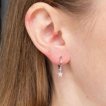 0.1TCW Round Moissanite Star Huggies Earrings - crownmoissanite