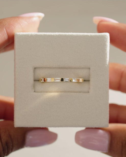 0.32 TCW baguette cut moissanite half eternity wedding band – sleek and modern gold ring featuring step-cut stones, perfect for stacking or contemporary bridal wear.