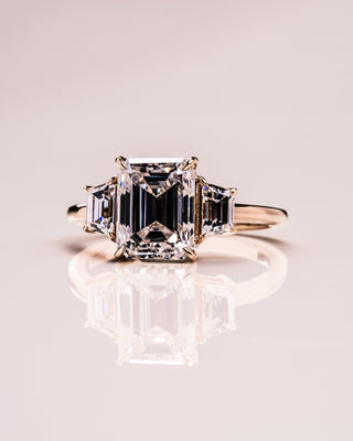 0.66 CT Emerald Cut Three Stone Moissanite Engagement Ring - crownmoissanite