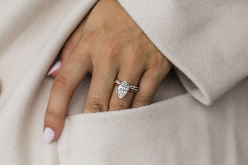 4.50 CT Pear Solitaire Bridge Moissanite Engagement Ring - crownmoissanite