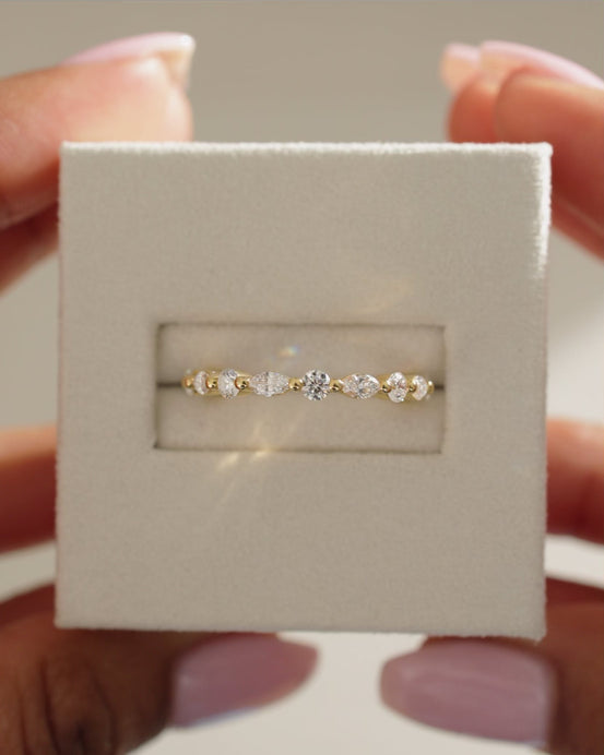 1.15 TCW marquise and round cut moissanite half eternity wedding band – elegant alternating design in polished gold, perfect for bridal stacking or standalone sparkle.