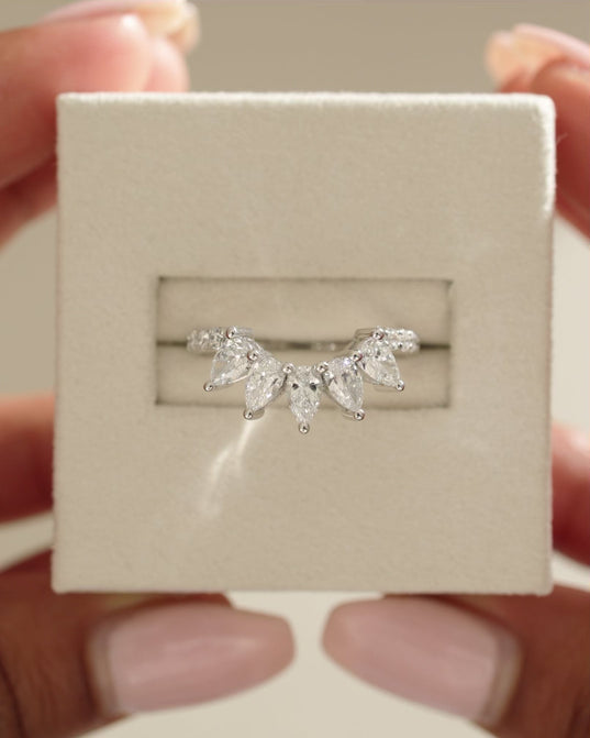 1.49 TCW pear and round cut moissanite wedding band in a bold crown-style design – dazzling, statement bridal ring crafted in polished gold for a regal look.