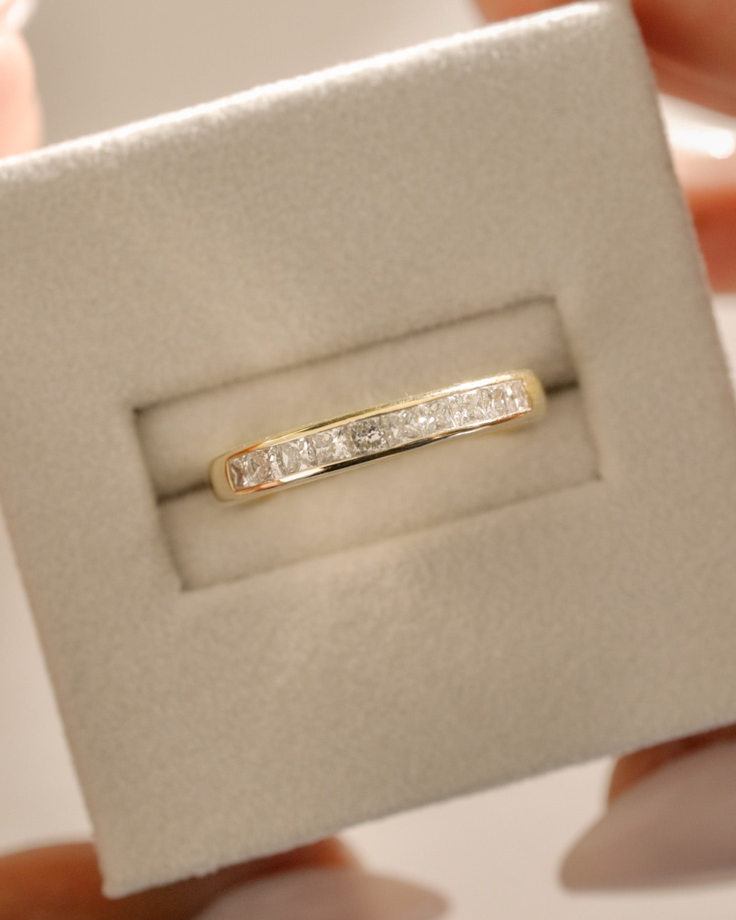 0.60 TCW princess cut moissanite wedding band in a sleek channel setting – modern and elegant gold ring, perfect for timeless bridal wear or stacking.