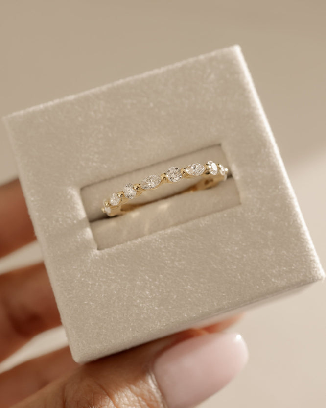 1.15 TCW marquise and round cut moissanite half eternity wedding band – elegant alternating design in polished gold, perfect for bridal stacking or standalone sparkle.