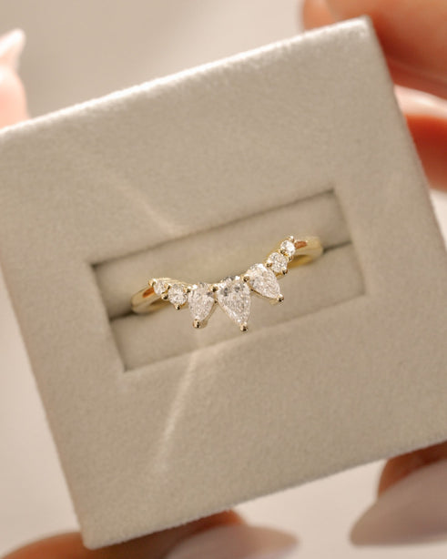 0.71 TCW pear and round cut moissanite wedding band in a regal crown-style design – sparkling and elegant gold ring, perfect for bridal stacking or statement wear.