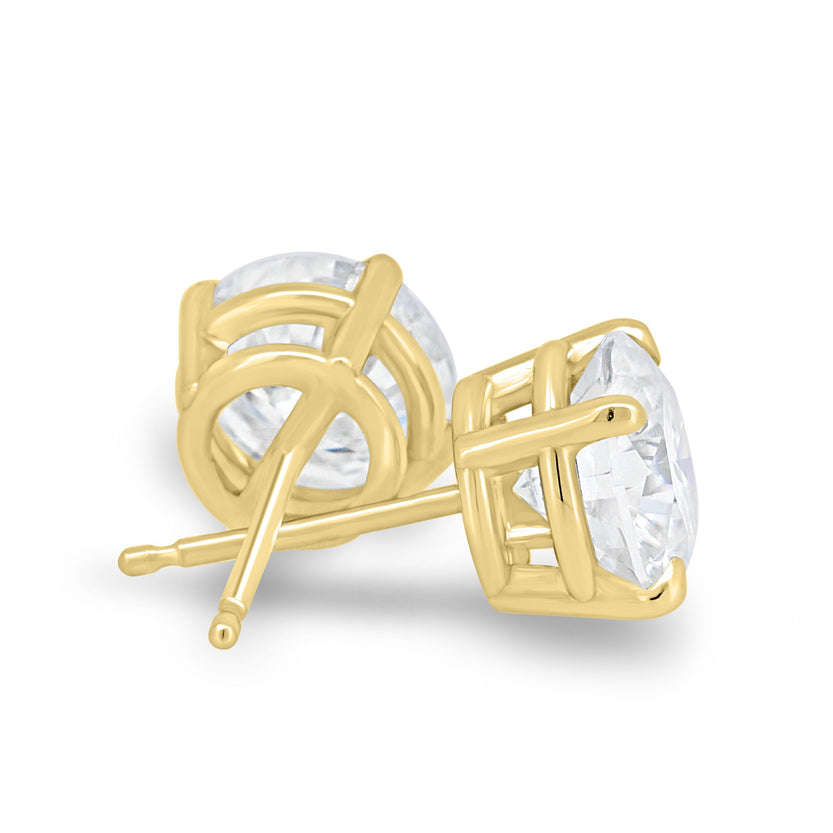 2.00 CT round cut moissanite earrings in a classic four-prong setting – brilliant and timeless gold studs, perfect for bridal elegance or everyday sophistication.