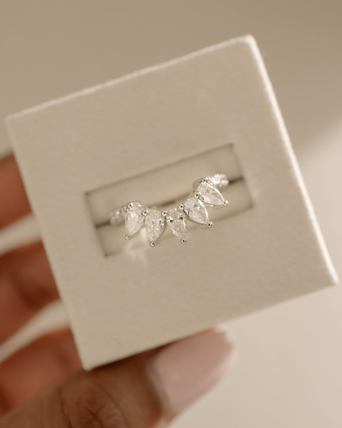 1.49 TCW pear and round cut moissanite wedding band in a bold crown-style design – dazzling, statement bridal ring crafted in polished gold for a regal look.