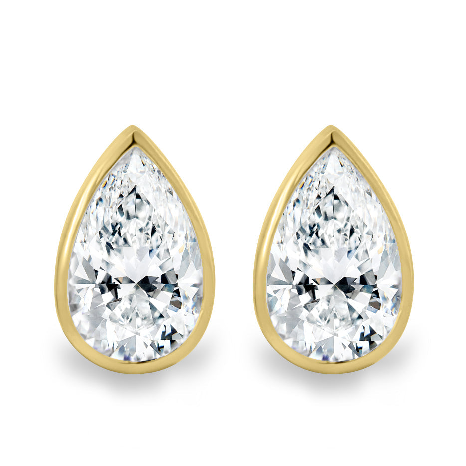 2.00 CT pear cut moissanite bezel set earrings – elegant and secure gold studs with a modern twist, perfect for bridal sparkle or everyday luxury.