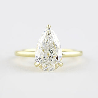 1.5 CT Pear Cut Solitaire Style Moissanite Engagement Ring - crownmoissanite