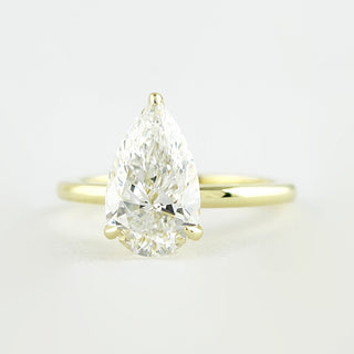 1.5 CT Pear Cut Solitaire Style Moissanite Engagement Ring - crownmoissanite