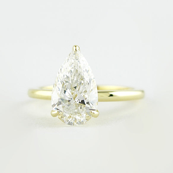 1.5 CT Pear Cut Solitaire Style Moissanite Engagement Ring - crownmoissanite