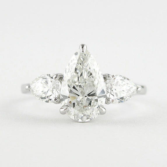 1.50 CT Pear Cut Three Stone Style Moissanite Engagement Ring - crownmoissanite