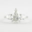 1.50 CT Pear Cut Three Stone Style Moissanite Engagement Ring - crownmoissanite