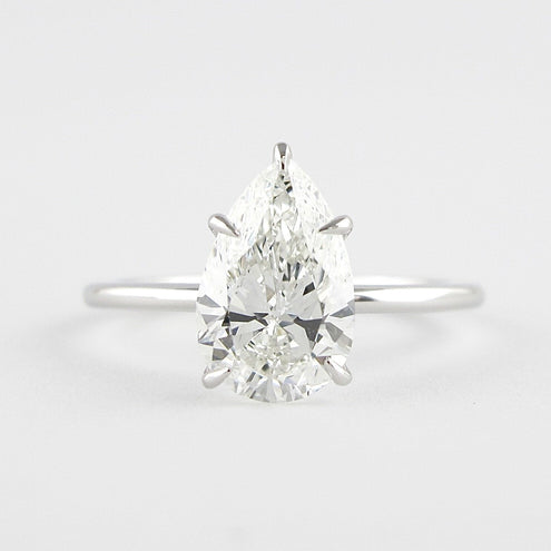 1.5 CT Pear Cut Solitaire Style Moissanite Engagement Ring - crownmoissanite