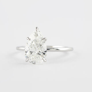 1.5 CT Pear Cut Solitaire Style Moissanite Engagement Ring - crownmoissanite