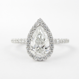 1.5 CT Pear Cut Halo Style Moissanite Engagement Ring - crownmoissanite