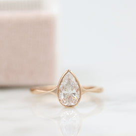 1.33 CT Pear Cut Bezel Solitaire Moissanite Engagement Ring - crownmoissanite