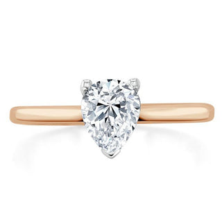 0.75 CT Pear Cut Solitaire Moissanite Engagement Ring - crownmoissanite