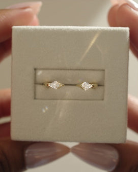 0.4 TCW kite cut moissanite open-style wedding band – contemporary and edgy design in polished gold, perfect for stacking or pairing with statement engagement rings.