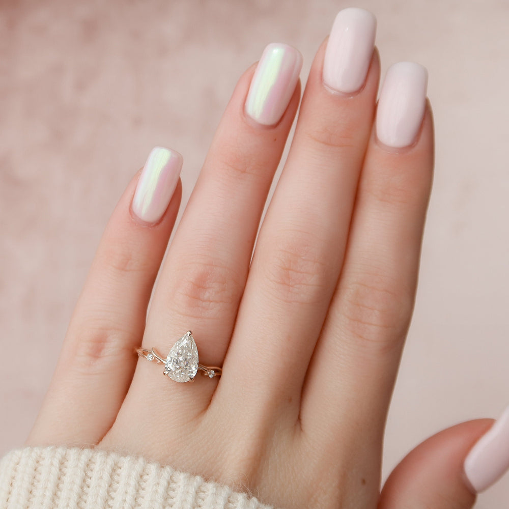 1.5 CT Pear Pave Twisted Moissanite Engagement Ring - crownmoissanite