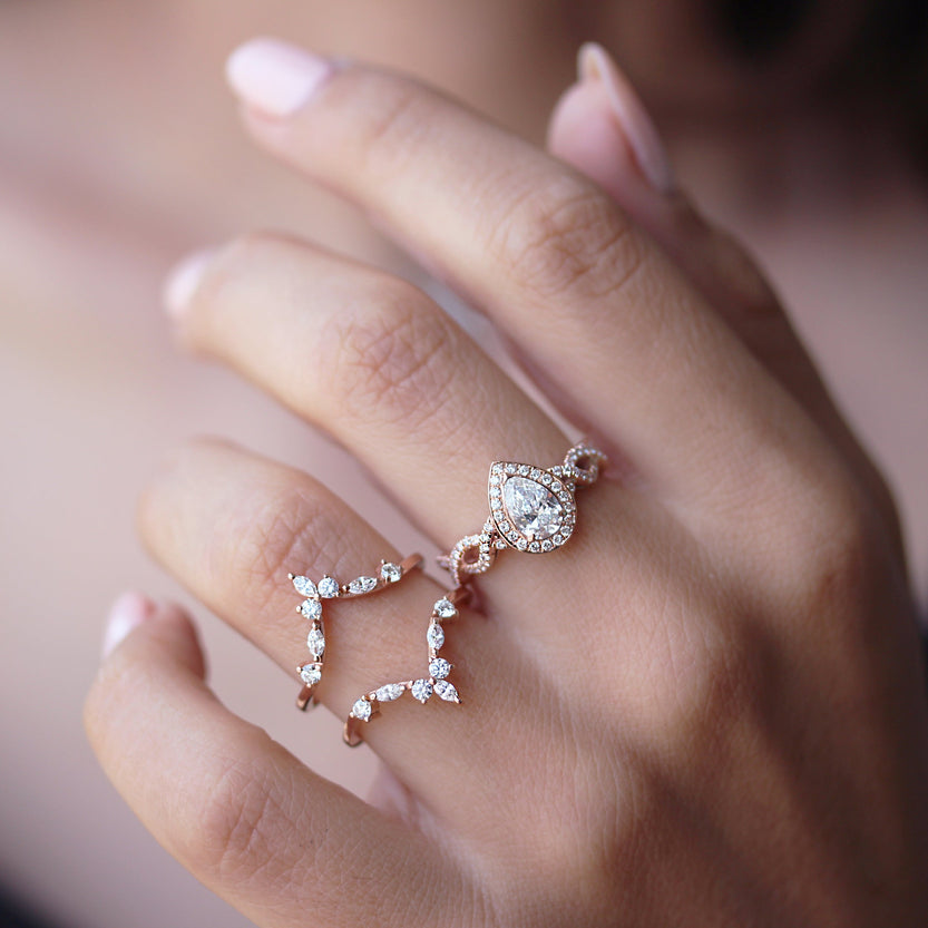 0.70 CT Pear Moissanite Twist Engagement Ring