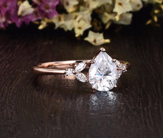 0.75 CT Pear Shaped Moissanite Cluster Engagement Ring - crownmoissanite